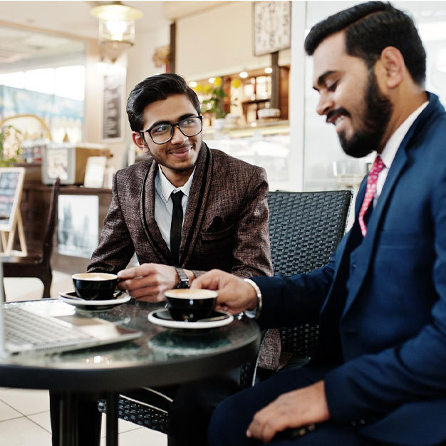 Two men having tea